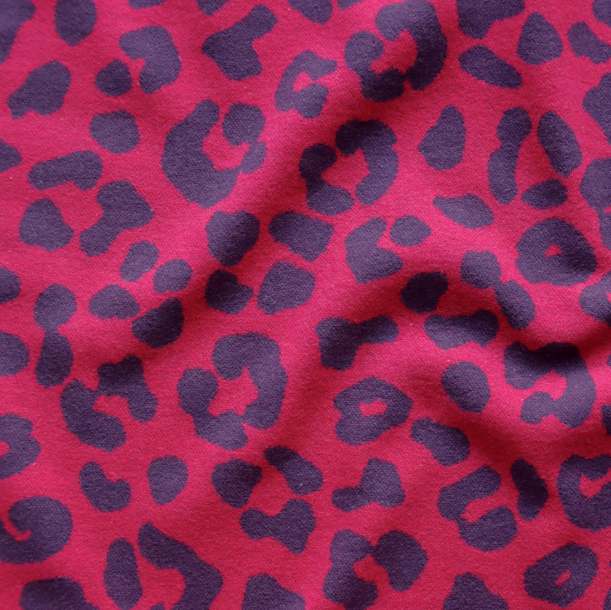 Eigenproduktion Jacquard - Sweat gebürstet - Leo - violett - pink