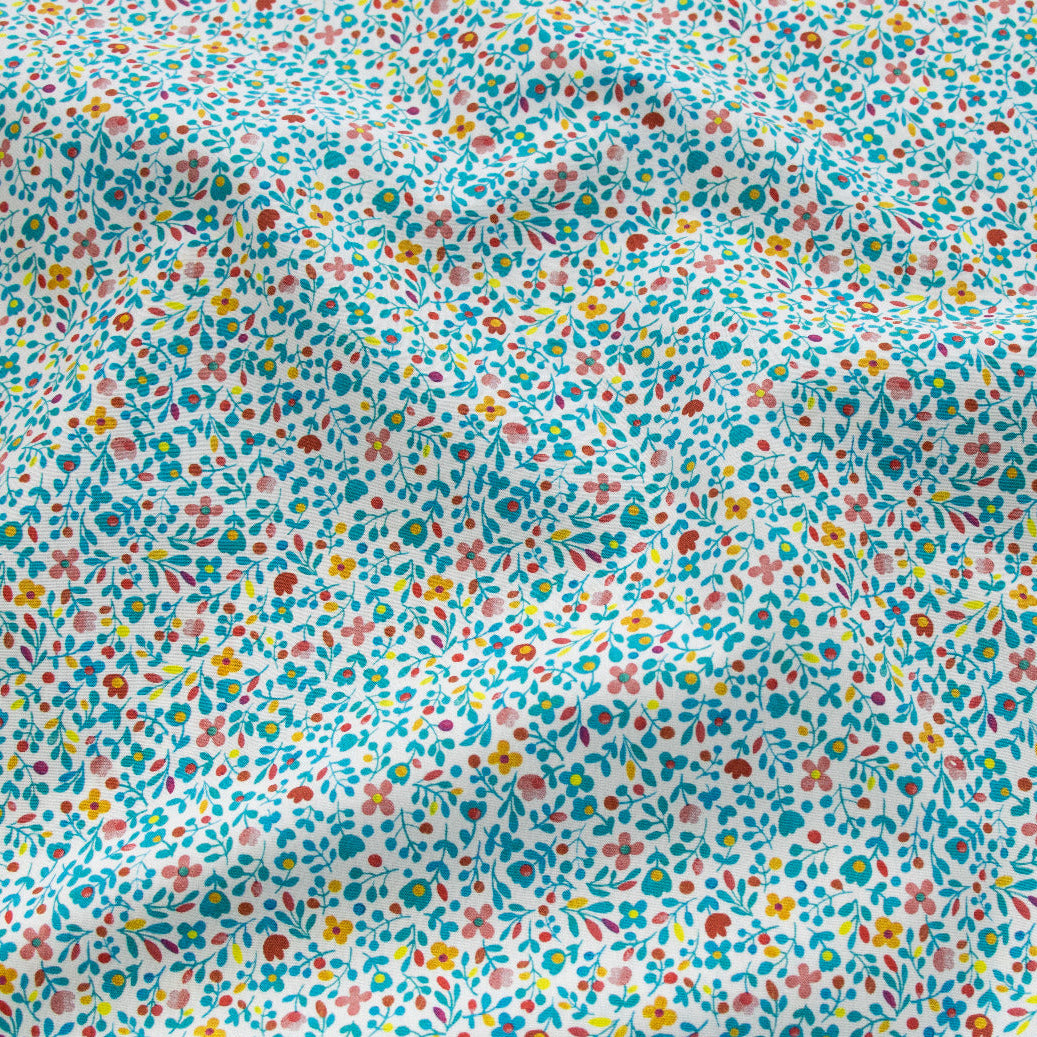 Webware Baumwolle - Happy Easter - kleine Frühlingsblümchen - weiß - blau