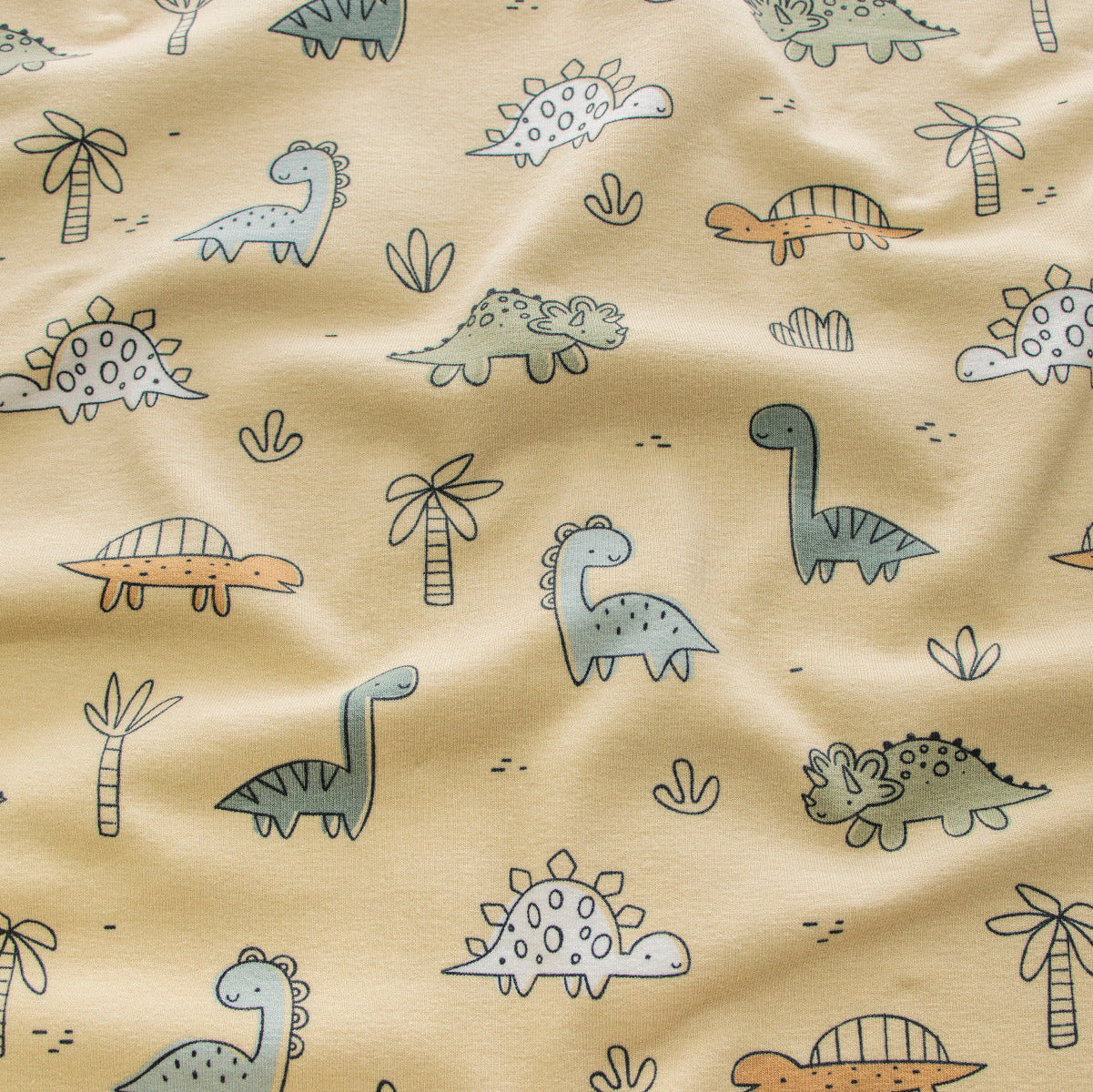 Jersey Baumwolle Stoff - Niedliche Dinos - Beige