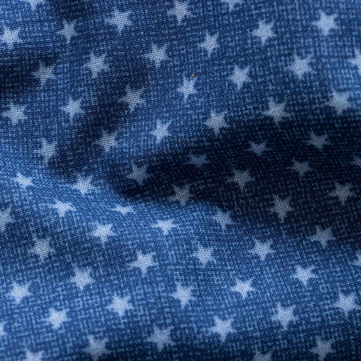 Beschichtete Webware Baumwolle in Jeansoptik - unregelmäßige Sterne - blau