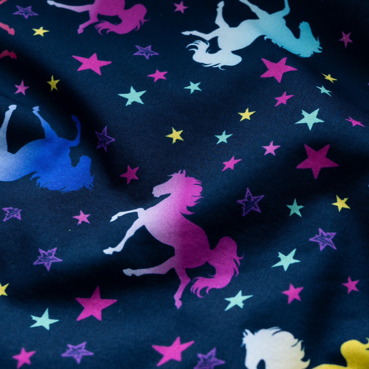 Softshell Jackenstoff - Regenbogenponys - dunkelblau