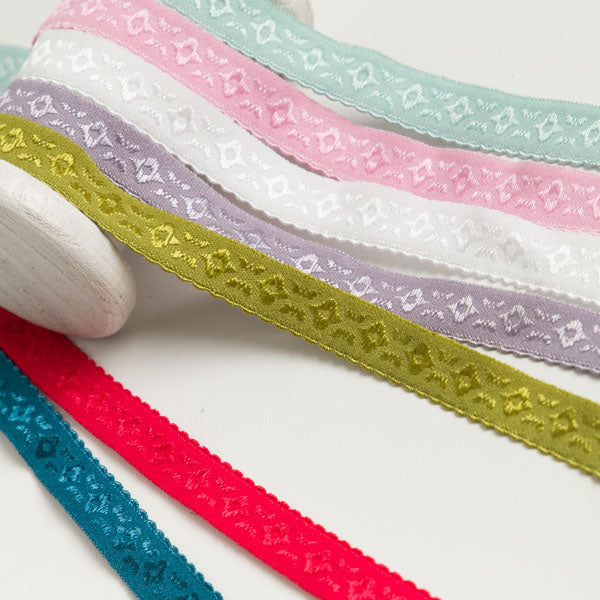 Elastisches Einfassband/Falzgummi bestickt