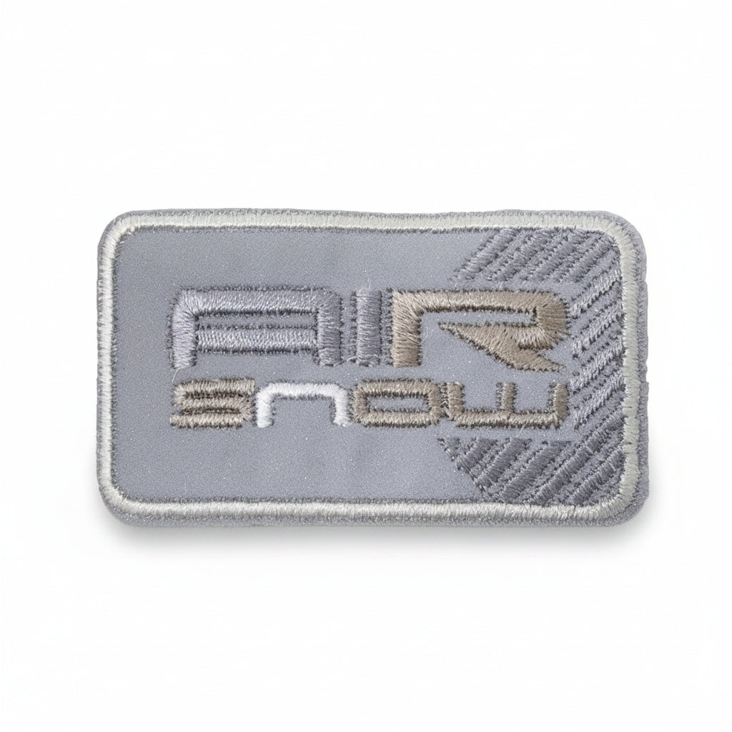 Applikation zum Aufbügeln Reflektor - reflektierender Wintersport-Schriftzug – grau