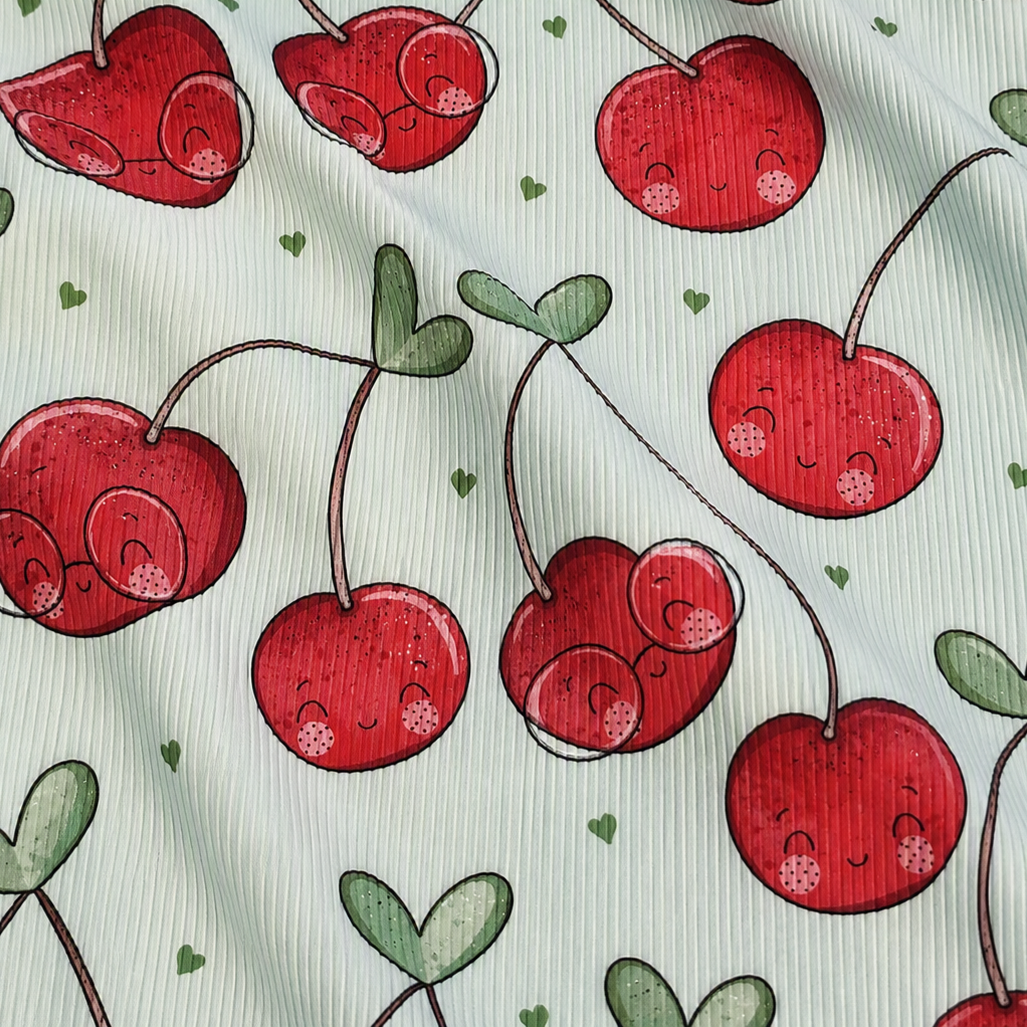 Eigenproduktion Ripp-Jersey Kirschen Katzengold-Design - Hellgrün