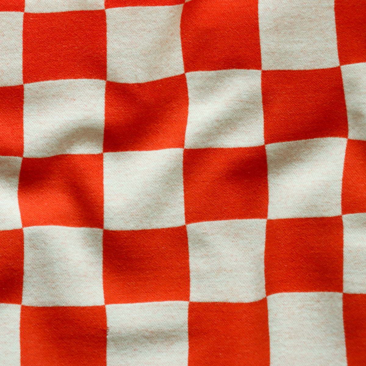 Eigenproduktion Jacquard - Sweat gebürstet - Schachbrett - rotorange - wollweiß
