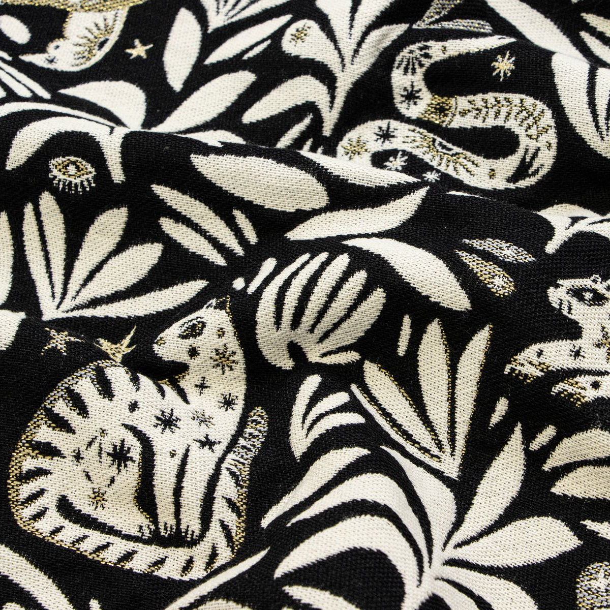 Jacquard Gobelin Dekostoff mit Glitzer - Safarietiere und Blätter - schwarz