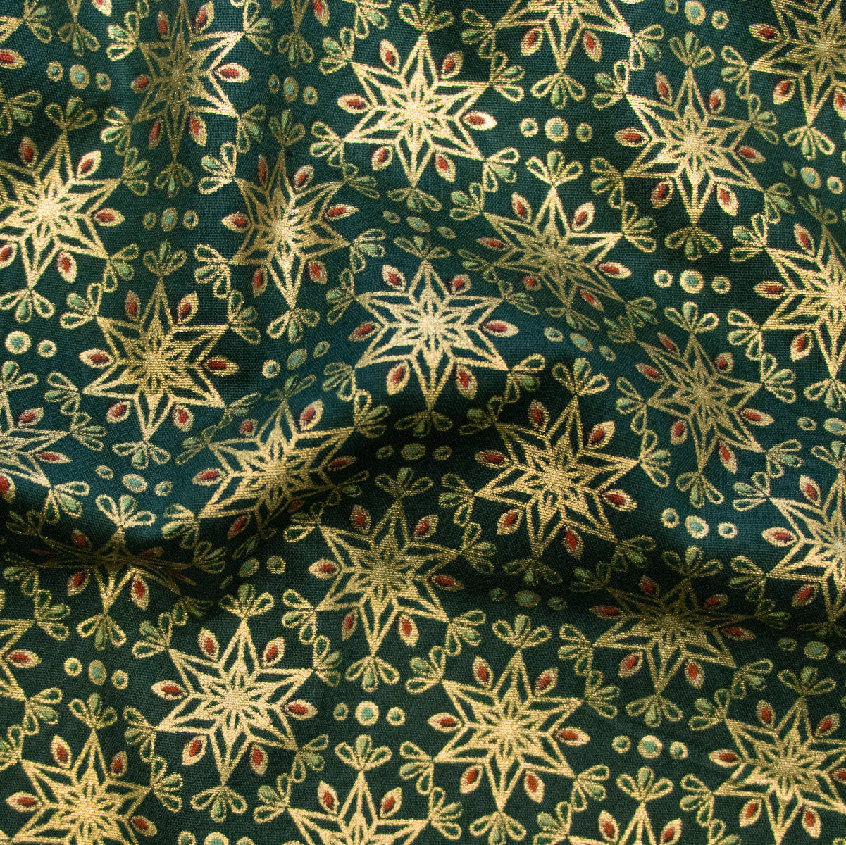 Webware Baumwolle Popeline mit Foliendruck - Schneeflocken - Dunkelgrün