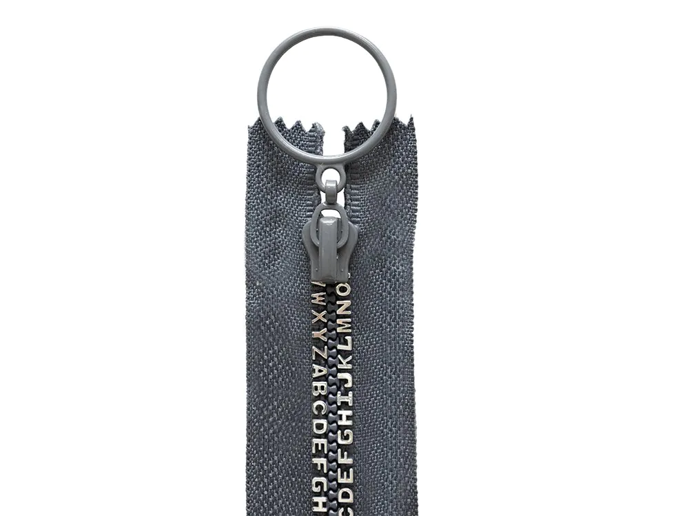 Reißverschluss "Buchstaben" nicht trennbar ca. 15cm - grau