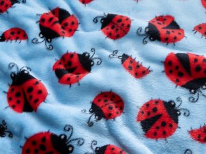 Wellnessfleece - Marienkäfer - jeansblau