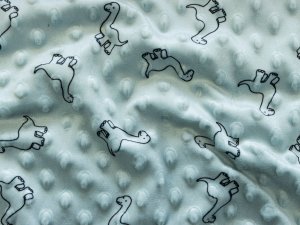 Wellnessfleece Minky mit Noppenprägung - putzige Dinos - altgrün