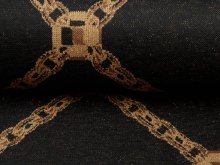 Jersey Strick mit Glitzerfäden - verschlungene Ketten - schwarz-braun