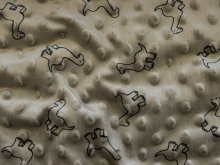 Wellnessfleece Minky mit Noppenprägung - putzige Dinos - sand