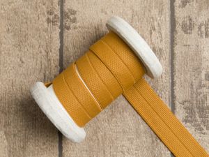 Elastisches Einfassband/Falzgummi - uni ockergelb
