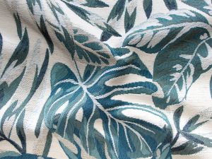 Nahaufnahme von Jacquard Dekostoff - Blätter - hellgrau - türkis