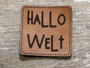 Label Kunstleder KDS - Hallo Welt  - braun