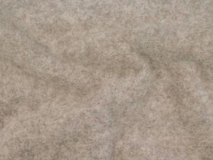 Nahaufnahme von einem Wollfleece in der Farbe beige