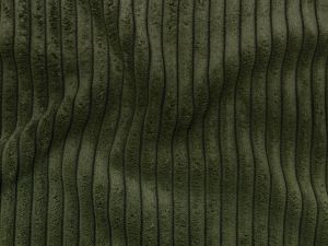 Nahaufnahme von einem Cordstoff in der Farbe grün