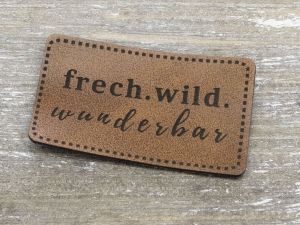 Nahaufnahme von Label Kunstleder KDS - frech.wild.wunderbar - braun