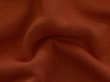 Nahaufnahme des leicht angerauten Sweat-Stoffs in uni Terracotta – ideal für die Herstellung von Sweatshirts, Hoodies und gemütlicher Freizeitbekleidung. Der Stoff ist weich, atmungsaktiv und bietet eine angenehme Oberfläche.