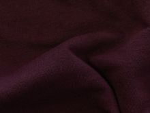 Nahaufnahme des leicht angerauten Sweat-Stoffs in uni Dunkellila – ideal für die Herstellung von Sweatshirts, Hoodies und bequemer Freizeitbekleidung. Der Stoff ist weich, atmungsaktiv und bietet eine angenehme Oberfläche.