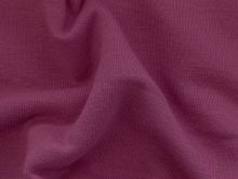 Nahaufnahme des leicht angerauten Sweat-Stoffs in uni Beere – zeigt die strukturierte Oberfläche und die weiche Textur des Stoffes, ideal für die Herstellung von Sweatshirts und bequemer Kleidung
