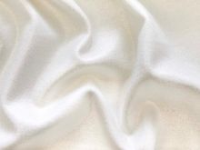 Nahaufnahme Jersey Punta di Roma - Romanit - elastisch mit Glitzer in wollweiß