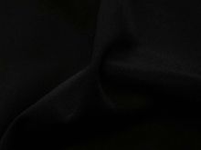 Nahaufnahme von einem Baumwollsatin leicht dehnbar in uni schwarz.
Ideal geeignet zur Fertigung von eleganter Bekleidung wie Hosen, Kostüme, Blazer, Anzüge oder auch zur Dekoration.
