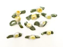 Nahaufnahme von Set Mini Röschen zum Annähen 10 Stück - Rosen - gelb
