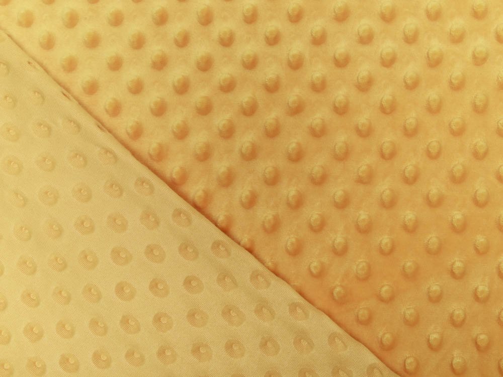 Wellnessfleece Minky mit Noppenprägung - uni safran