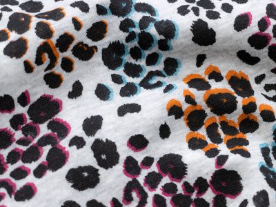 Alpenfleece Melange - Animalprint in Kreisform - meliert grau